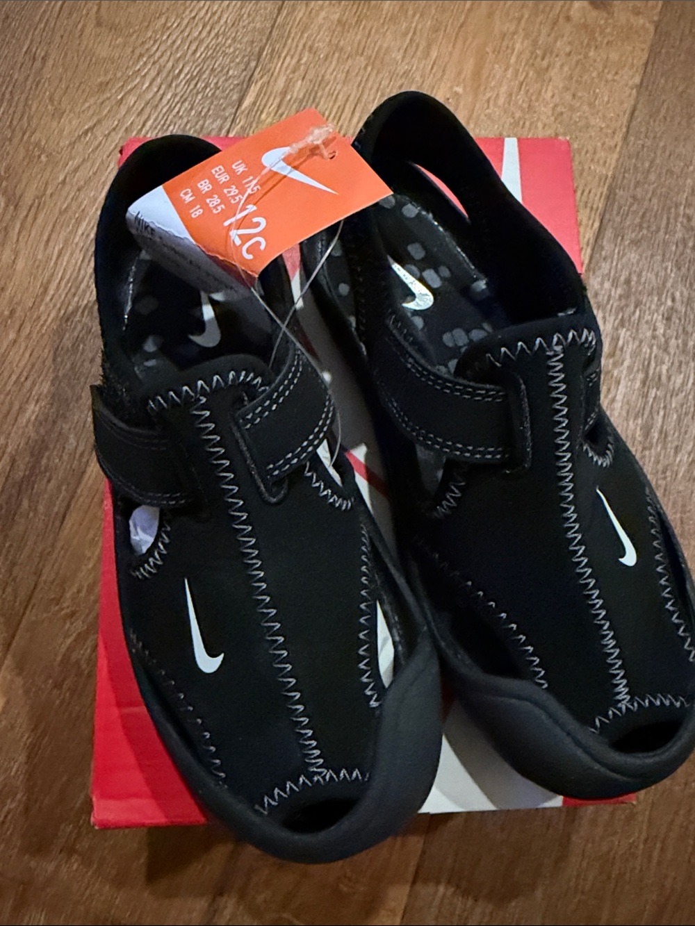 Nike Black Slip-On Sport Sandals with White Swoosh